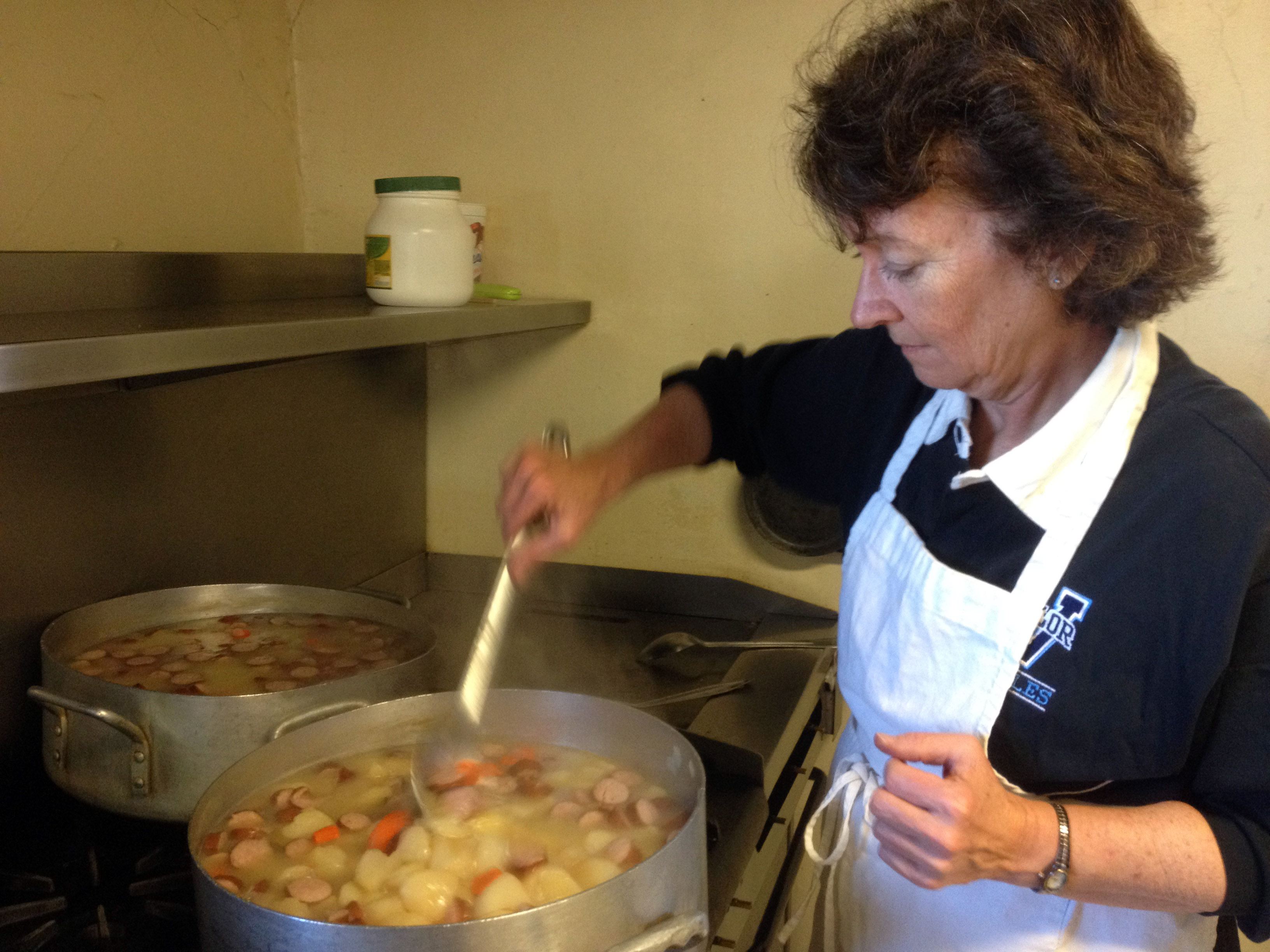 Kim on a missions trip in 2013 cooking dinner for fifty children and staff at Rancho Los Amigos, a childrens' home in Mexico.